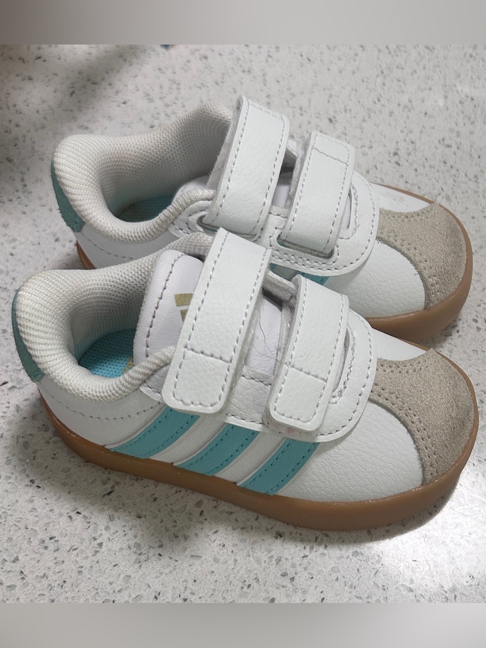 Like new baby adidas leather sneakers size 4